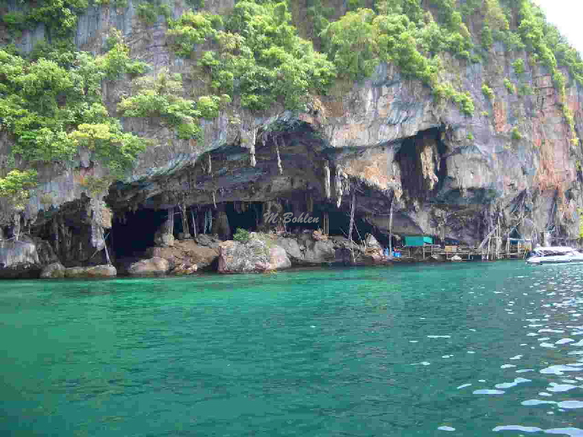 Fischer die in H�hlen wohnen auf dem Weg nsch Phiphi Island